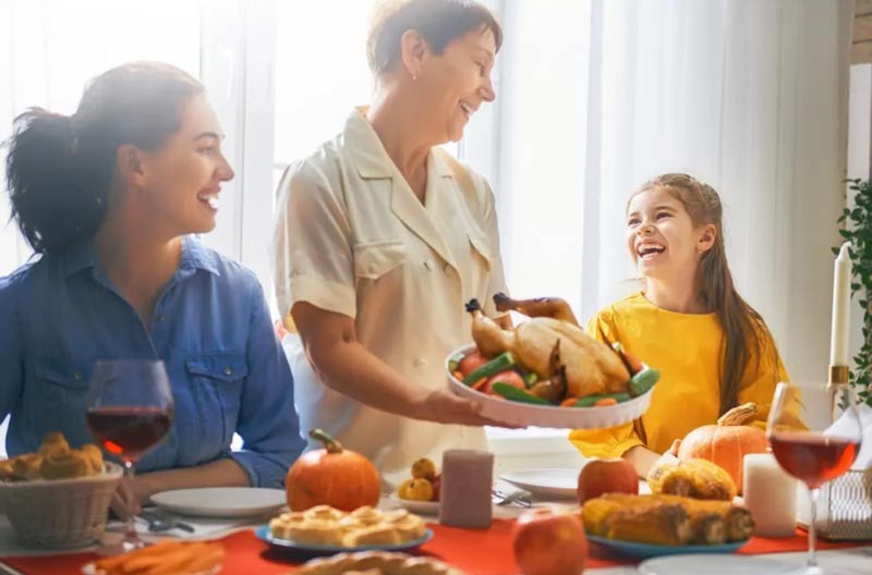 Family Laughing together in kitchen