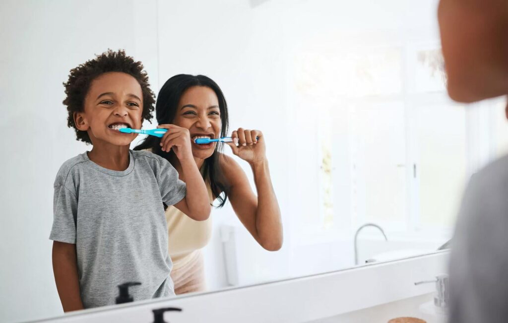 mother and child brushing