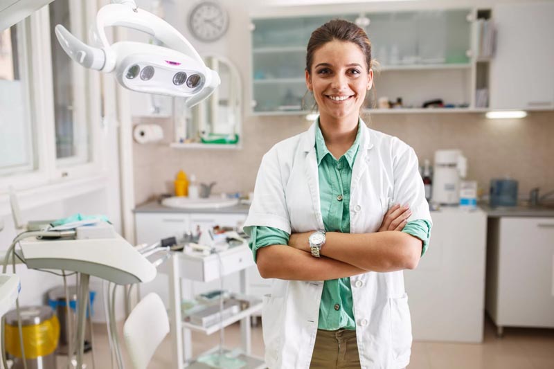 Dentist in her clinic