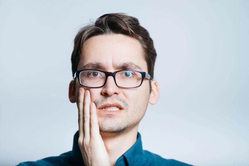 Man with a tooth pain