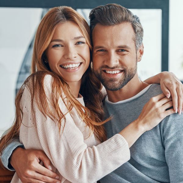 happy middle age couple smiling